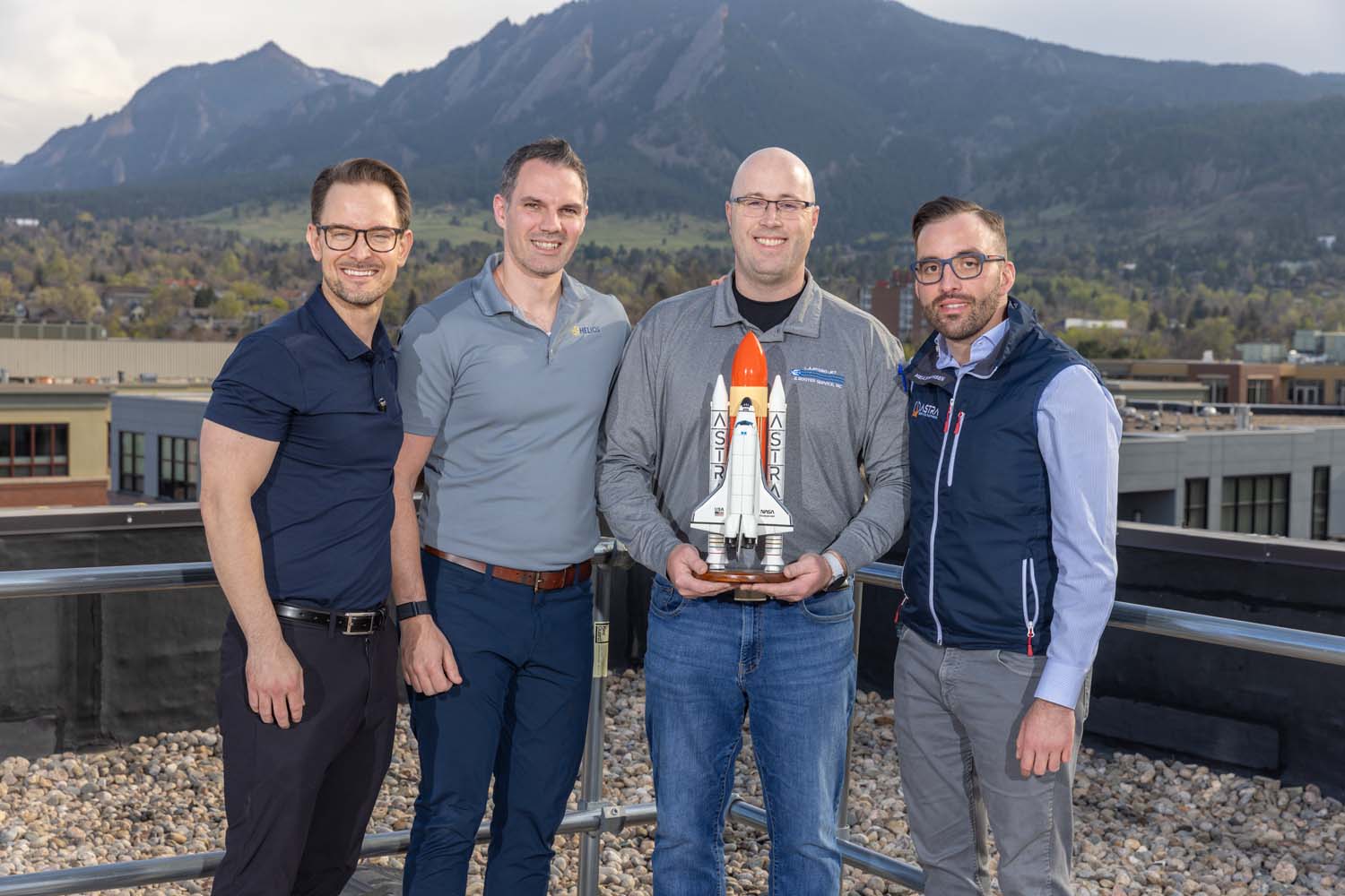 From L to R: Scott Ingold, Adam Marshall, and Alberto Gomez (far right) present Tim McCormick (center), president of LA Hydrojet the award for best performing OpCo. 